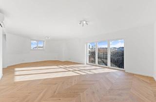 Wohnung kaufen in 1040 Wien, Luxuriöse Dachgeschosswohnung in toller Lage des 4. Bezirks mit schönem Ausblick über Wien