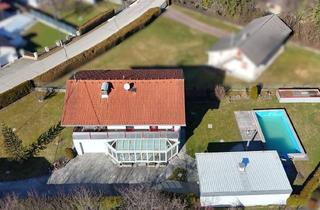 Einfamilienhaus kaufen in 9065 Ebenthal, Wohnen wie im Urlaub: Haus mit Pool, Viel Grün & Privatsphäre in Ebenthal