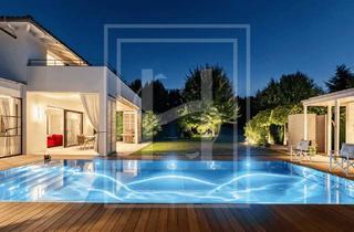 Villen zu kaufen in 4600 Thalheim bei Wels, Architektenvilla der Extraklasse mit Edelstahl-Pool, Spa & Heimkino