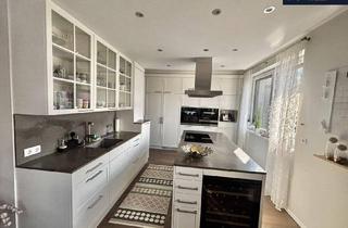 Wohnung kaufen in 3400 Klosterneuburg, Architektendesignte Luxus-Dachgeschosswohnung in privater Parkanlage mit Naturpool