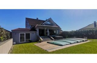 Haus kaufen in 2443 Deutsch-Brodersdorf, MODERNE ELEGANZ - GROSSZÜGIGER FAMILIENHIT MIT POOL UND POOLHAUS