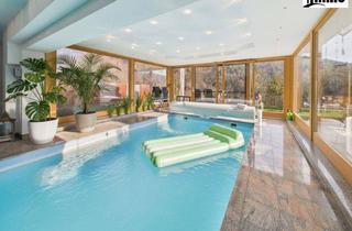 Villen zu kaufen in 9873 Döbriach am Millstätter See, Wohnen auf höchstem Niveau – Villa mit Indoor-Pool, Sauna & Seeblick