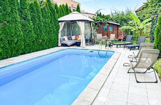 Einfamilienhaus kaufen in 2230 Gänserndorf, Charmantes Einfamilienhaus mit beheizbarem Pool, Wintergarten, Klimaanlage & Gartenidylle I Nähe Zentrum Gänserndorf