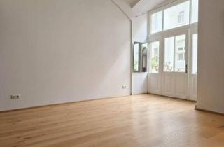 Wohnung kaufen in 1020 Wien, Stilvolle Altbauwohnung mit historischem Flair & Gemeinschaftsgarten