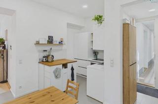 Wohnung kaufen in 1150 Wien, Renovierter Altbau-Charme mit Hofseitiger Loggia