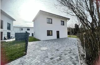 Einfamilienhaus kaufen in 2512 Traiskirchen, Erstbezug! Familientraum mit Garten in Traiskirchen, große private Zufahrt inklusive.