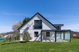 Einfamilienhaus kaufen in 8454 Arnfels, Ein Zuhause, das jeden Tag besonders macht: Modernes Familienhaus in Arnfels, eingebettet in die Hügellandschaft der Südsteiermark mit Blick auf das Schloss und viel Raum zum Leben