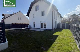 Doppelhaushälfte kaufen in Mitterweg, 2751 Steinabrückl, Elegant Wohnen im Grünen! Großzügige Doppelhaushälfte mit Terrassen, Garten und 2 Parkplätzen.