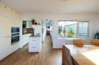 Reihenhaus kaufen in 1230 Wien, Atriumreihenhaus mit Wow-Effekt – stilvoll wohnen mit 51 m² Außenfläche