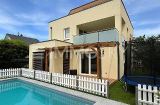 Wohnung kaufen in 4052 Ansfelden, Neuwertiger Familientraum mit herrlichem Garten, Pool, Wintergarten