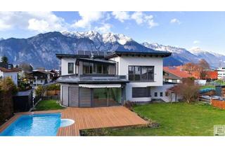 Einfamilienhaus kaufen in 6091 Götzens, Exklusives Einfamilienhaus mit Einliegerwohnung, beheiztem Pool & herausragendem Energiekonzept