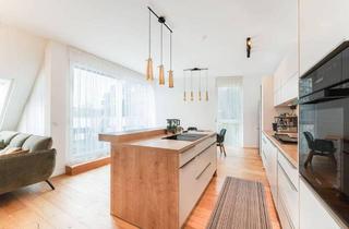 Wohnung kaufen in Dr.-Heckmann-Straße, 1140 Wien, Lichtdurchflutete Dachgeschosswohnung mit Freiflächen und Stellplatz