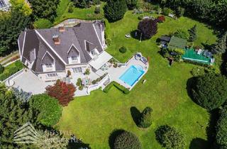 Villen zu kaufen in 2371 Hinterbrühl, Beeindruckende Villa mit gepflegtem Garten und Pool als Investment