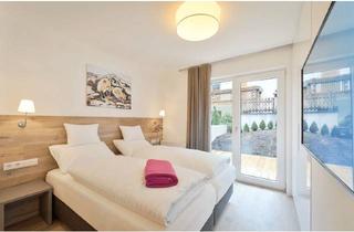 Wohnung kaufen in Löfflerweg, 6580 Sankt Anton am Arlberg, St. Anton: Helle Alpen-Style Suite mit Sauna und sonniger Terrasse mit kleinem Gartenanteil