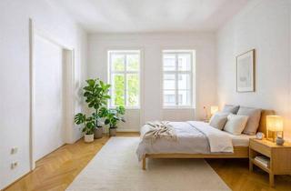 Wohnung kaufen in 1080 Wien, Das Stadtleben in Ruhe genießen: Stil-Altbauwohnung in lebendiger Lage an der Grenze 7./8. Bezirk