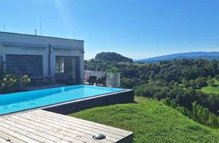 Wohnung kaufen in 8472 Straß in Steiermark, Above It All - Luxus-Apartment am Hochgrassnitzberg mit Aussicht und Anlagefaktor