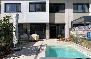 Reihenhaus kaufen in 1220 Wien, Urlaubsflair zu Hause - auf 3 Ebenen + E-Parkplatz