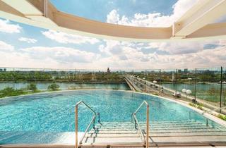 Wohnung kaufen in Donau, 1220 Wien, DANUBEFLATS I 15. Etage I 2-Zimmer Wohnung möbliert I Ausblick Kahlenberg I Pool und SPA