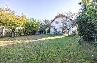 Einfamilienhaus kaufen in 1220 Wien, Modernisiertes Einfamilienhaus mit Luftwärmepumpe, Einlegerwohnung und Traumgarten in Essling