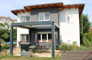 Einfamilienhaus kaufen in 1030 Wien, Charmantes Einfamilienhaus mit Garten, Pool & Top-Anbindung im 3. Bezirk
