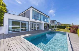 Villen zu kaufen in 9220 Auen, Moderne Beachfront-Villa in einzigartiger Lage am Wörthersee mit spektakulärem Blick