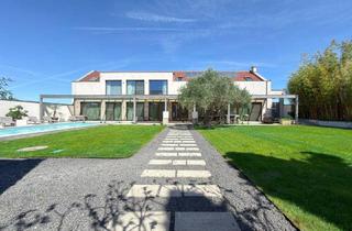 Haus kaufen in 7141 Podersdorf am See, Architektur-Juwel am Neusiedler See: Wenn Großzügigkeit auf absolute Privatsphäre trifft!