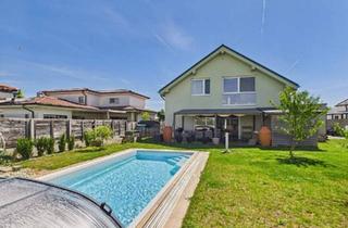 Einfamilienhaus kaufen in 2425 Nickelsdorf, Einziehen & genießen: Modernes Smart-Home mit Pool, Sauna und Doppelgarage in Nickelsdorf