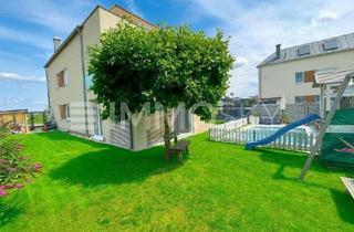 Wohnung kaufen in 4052 Ansfelden, Zauberhaftes Eigenheim mit Garten und Pool - elegant und zeitlos!