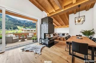 Penthouse kaufen in 6371 Aurach bei Kitzbühel, Exklusives Penthouse – Erstbezug mit direktem Liftzugang, offenem Wohnkonzept, Glaskamin & traumhaftem Bergblick in sonniger Top-Lage