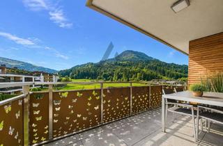Wohnung kaufen in 6365 Kirchberg in Tirol, Stilvolle 3-Zimmer-Wohnung mit Terrasse und traumhaftem Bergblick