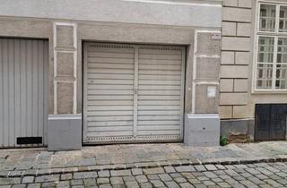 Garagen kaufen in 1080 Wien, Große Garagenbox mit Ebener Zufahrt und WC im Herzen des 8. Bezirks im Roten Hof