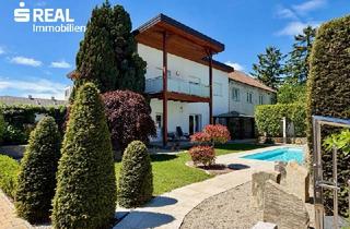 Einfamilienhaus kaufen in 2486 Pottendorf, Entzückendes Haus mit 3 Wohneinheiten, Garten und Swimming Pool - Einziehen und Wohlfühlen