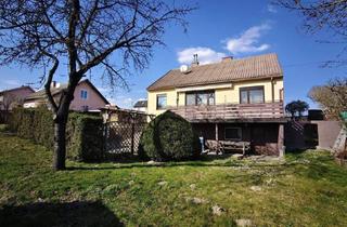 Einfamilienhaus kaufen in 2000 Stockerau, EFH mit großem Grundstück (1.164m²; teilbar) mit Garage, Carport und drei Gartenhäuschen