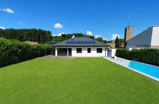 Haus kaufen in 4863 Seewalchen am Attersee, Traumhaftes Wohnen in Seenähe Exklusiver Hartl-Haus Bungalow mit sonnigem Garten, Einzelgarage, Doppelcarport Pool & PV-Anlage in Seewalchen am Attersee