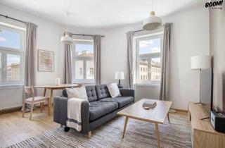 Wohnung kaufen in 1100 Wien, Befristet vermietete 2-Zimmer-Altbauwohnung im 2. Stock - 3,9% Rendite