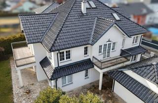 Villen zu kaufen in 4614 Marchtrenk, Premium-Wohnhaus in Marchtrenk mit Doppelgarage, Balkon(E), Terrasse, Grillhaus, Keller!