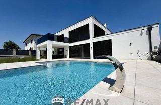 Villen zu kaufen in 2432 Schwadorf, Moderne Villa mit Pool