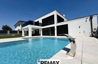 Villen zu kaufen in 2432 Schwadorf, Moderne Villa mit Pool