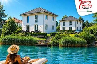 Villen zu kaufen in 2333 Leopoldsdorf, Haus am See in Leopoldsdorf bei Wien - Exklusive Stadtvilla mit privatem Seezugang