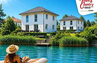 Villen zu kaufen in 2333 Leopoldsdorf, Haus am See in Leopoldsdorf bei Wien - Exklusive Stadtvilla mit Privatem Seezugang