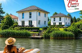 Villen zu kaufen in 2333 Leopoldsdorf, Haus am See in Leopoldsdorf bei Wien - Exklusive Stadtvilla mit Privatem Seezugang