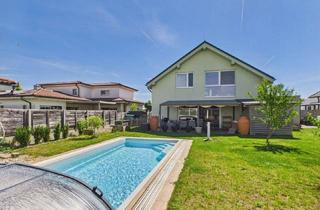 Einfamilienhaus kaufen in 2425 Nickelsdorf, Einziehen & genießen: Modernes Smart-Home mit Pool, Sauna und Doppelgarage in Nickelsdorf