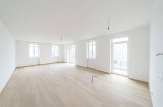 Wohnung kaufen in 1020 Wien, Modern gestaltete Altbauwohnung mit großzügigem Wohnbereich und südseitigen Außenflächen