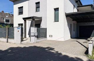 Einfamilienhaus kaufen in 4614 Marchtrenk, Zwei Wohneinheiten, ein Zuhause: Modernes Zweifamilienhaus im Herzen von Marchtrenk