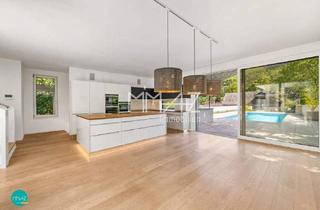 Villen zu kaufen in 2371 Hinterbrühl, Private Oase in Hinterbrühl! Architekturvilla mit Pool und separater Dependance für Arbeit und Wellness. Panoramablick