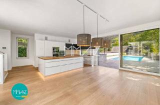 Villen zu kaufen in 2371 Hinterbrühl, Private Oase in Hinterbrühl! Architekturvilla mit Pool und separater Dependance für Arbeit und Wellness. Panoramablick