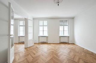 Wohnung kaufen in 1080 Wien, Fischgrätparkett, Stuck & Flügeltüren – sanierte stilvolle Altbauwohnung in der Josefstadt
