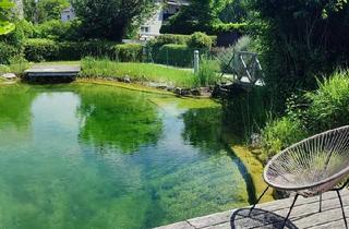 Wohnung kaufen in 2500 Baden, Exquisites Wohnen mit großzügiger Sonnen-Terrasse und Schwimmbiotop