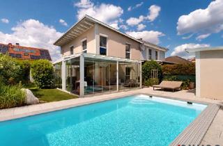 Einfamilienhaus kaufen in 2325 Himberg, **Private Wohlfühloase mit Pool, Wintergarten & unverbaubarem Blick ins Grüne**
