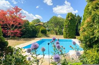 Einfamilienhaus kaufen in 2514 Traiskirchen, Sehr charmantes Einfamilienhaus mit traumhaftem Pool, Wintergarten, großem Carport und Garten mit einigen Extras
